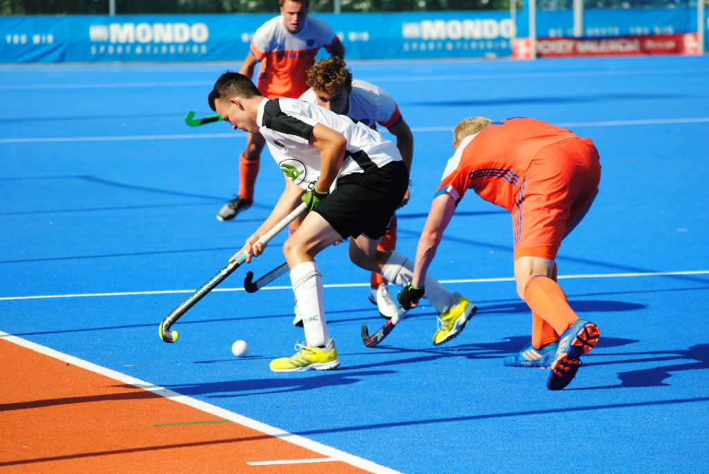 Partido de hockey campo